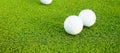 top view flat lay of golf balls on grass background, the concept of a sport for the rich, luxury, fitness, game Royalty Free Stock Photo