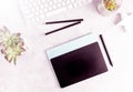 Top view flat lay graphic tablet on grey office table. Modern designer`s work place Royalty Free Stock Photo
