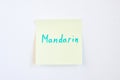 top view flat lay of mandarin language which written on the yellow reminder notepaper