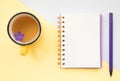 Blank notepad with flower white and yellow background.