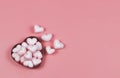 flat lay of pink heart shape marshmallow in red heart shape gift box on pink background. Valentine\'s day and candy concept Royalty Free Stock Photo