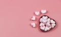 flat lay of pink heart shape marshmallow in red heart shape gift box on pink background. Valentine\'s day and candy concept Royalty Free Stock Photo