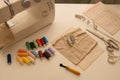 flat lay sewing supplies, still life with sewing machine, patterns and threads Royalty Free Stock Photo