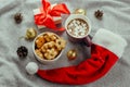 flat lay star shaped cookies,hot chocolate,gift box and Santa Claus red hat
