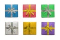 Top view or flat lay of various shiny colorful blue, red, green, silver, gold, purple christmas gift or present boxes, isolation Royalty Free Stock Photo