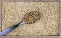 Top view of flour golden flaxseeds or golden linseed Linum usitatissimum