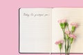 Top view of flowers on open paper notebook with handwritten words Today I'm grateful for Royalty Free Stock Photo