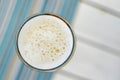 Top view of a foamy mug of cold beer on a hot summer day in a re Royalty Free Stock Photo