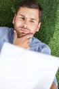 Top view of focused businessman analyzing documents