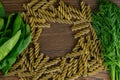 Top view of foglie spinach pasta on black wooden table with space for your text. Top views with clear space Royalty Free Stock Photo