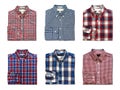 Top view of folded red, blue and white color long sleeve plaid shirts isolated on white background Royalty Free Stock Photo