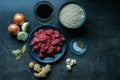 Top view of food ingredients, with meat, ingredients and beef on dark floor, Indonesian ingredients. Preparation of food