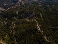 Top view on forested rocky hills landscape