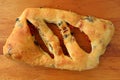 Top View of a Fougasse French Bread with Sun Dried Tomato and Olive on Wooden Background Royalty Free Stock Photo