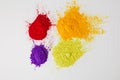 Top view of four colors of holi powder for Hindu spring festival,