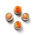 Top view of four sushi rolls.