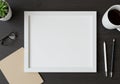 Minimalist Workspace Flat Lay with Blank Photo Frame Mug of Coffee Notebook and Plant Mockup Ready for Your Design Royalty Free Stock Photo