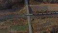 Top View Freight Train Passing Railway Crossing. Aerial Drone View Flight Over Royalty Free Stock Photo