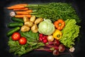 Top view of fresh assorted vegetables on dark black background Royalty Free Stock Photo