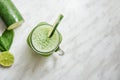 Top view of a fresh cucumber smoothie jar mug Royalty Free Stock Photo