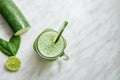 Top view of a fresh cucumber smoothie jar mug Royalty Free Stock Photo