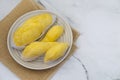 Top view Fresh durian in packaging on plate Famous tropical fruit. Durian king of Thailand fruit Royalty Free Stock Photo