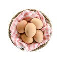 Top view fresh egg in basket isolated on white. Royalty Free Stock Photo