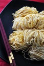 Top view of Fresh Egg Noodles on Black Plate