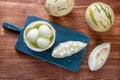 fresh fruit melon on chopping board