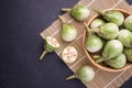 Top view fresh green Thai eggplant on black stone Royalty Free Stock Photo