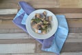 Top view of fresh herring fillet on a rustic shebby wooden background