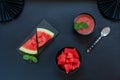 Top view of fresh iced homemade watermelon sorbet, granita, smoothie on black background Royalty Free Stock Photo