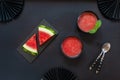 Top view of fresh iced homemade watermelon sorbet, granita, smoothie on black background Royalty Free Stock Photo