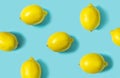 Top view of fresh lemon isolated on blue background. Fruit minimal concept. Royalty Free Stock Photo