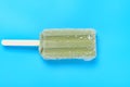 Fresh mung bean popsicle on a blue background