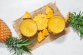 Top view of fresh pineapple juice in the glass with pineapple fr Royalty Free Stock Photo