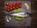 Top View of Fresh Raw Whole Fish Mackerel on Slate Cutting Board Royalty Free Stock Photo