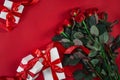 Top view fresh red rose flower and gift box on red deck with emp Royalty Free Stock Photo