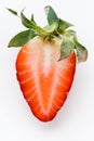 Top view of fresh red strawberries slice isolated on white background. Summer berries textured background. Flat lay. Macro shot of Royalty Free Stock Photo