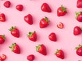 Top view of a fresh red strawberry against a pink background. Royalty Free Stock Photo