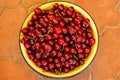 Top view of Fresh Ripe cherries in bowl on table background. Summer fruit. Healthy food concept. Copy space, top view Royalty Free Stock Photo