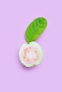 Top view of fresh ripe guava with leaf on pink