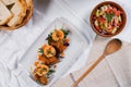 Top view of fresh salad, bread in a woven basket with fried chicken and rice with vegetables Royalty Free Stock Photo