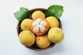 Top view fresh santol Sandoricum koetjape fruit in a Wicker basket.the famous fruit Thailand and seasonal fruit