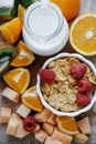 Top view of Fresh sliced fruit: raspberry, kiwi, melon, oranges Royalty Free Stock Photo