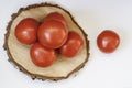 Top view of fresh tomatoes on a wooden board