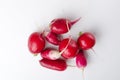 Top view of fresh washed heap of radish on the white background.Healthy inggredients for salad