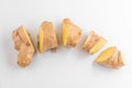 Top view on a freshly cut ginger root on white background Royalty Free Stock Photo