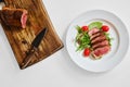 Top view of fried duck breast medium rare served on a plate Royalty Free Stock Photo