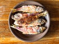 Top view of fried red mullet fishes on plate Royalty Free Stock Photo